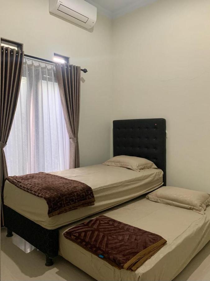 Guest House / Homestay Bukit Mutiara Residence Ngingas Bagian luar foto